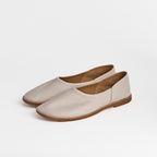 Los zapatos slip-on de cuero blancos minimalistas Dual Stride