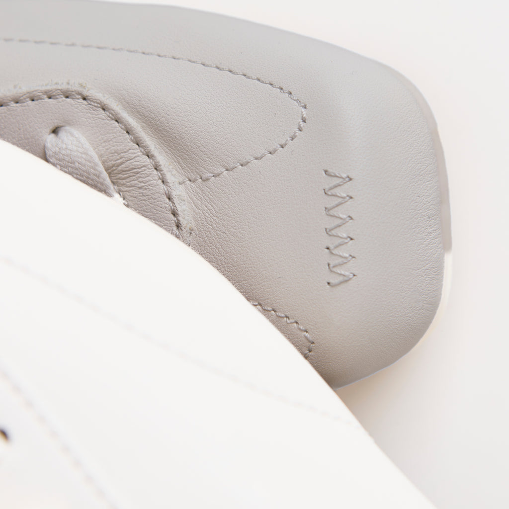 The Dual Stride White Classic Leather Sneaker