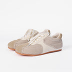 The Dual Stride Women‘s Distressed Ballet Canvas Low-Top Trainers