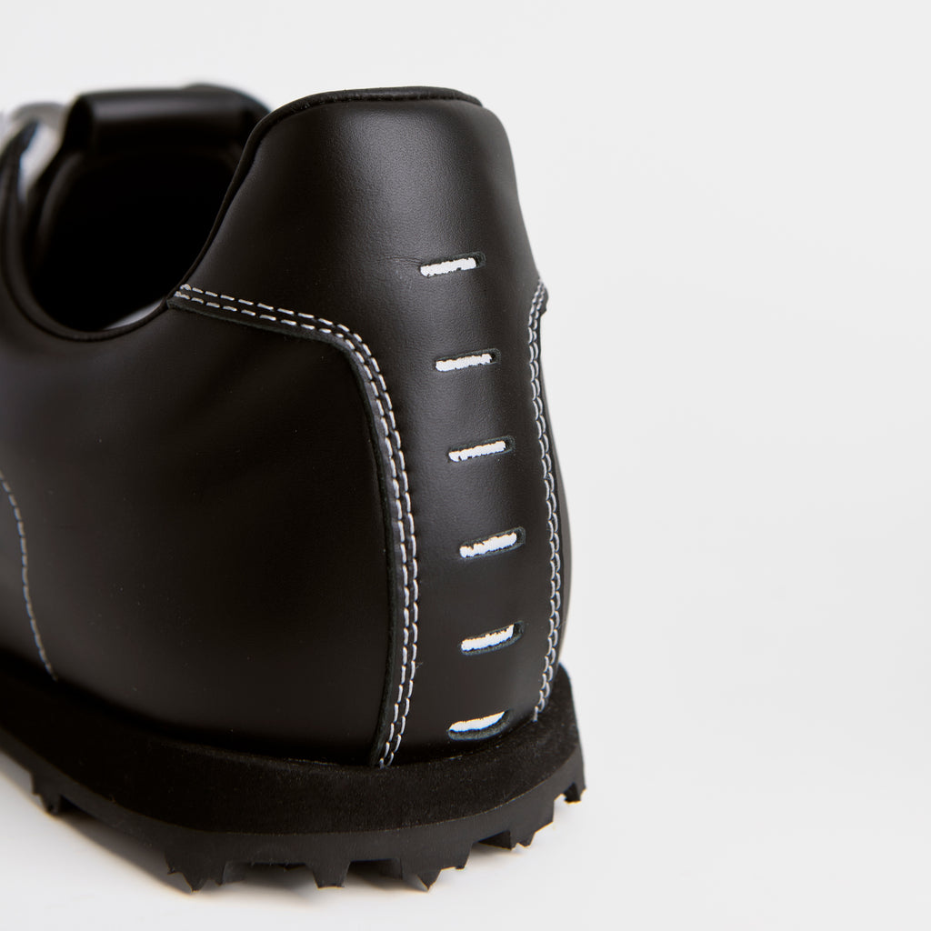 The Dual Stride Classic Black Leather Square-Toe Sneakers