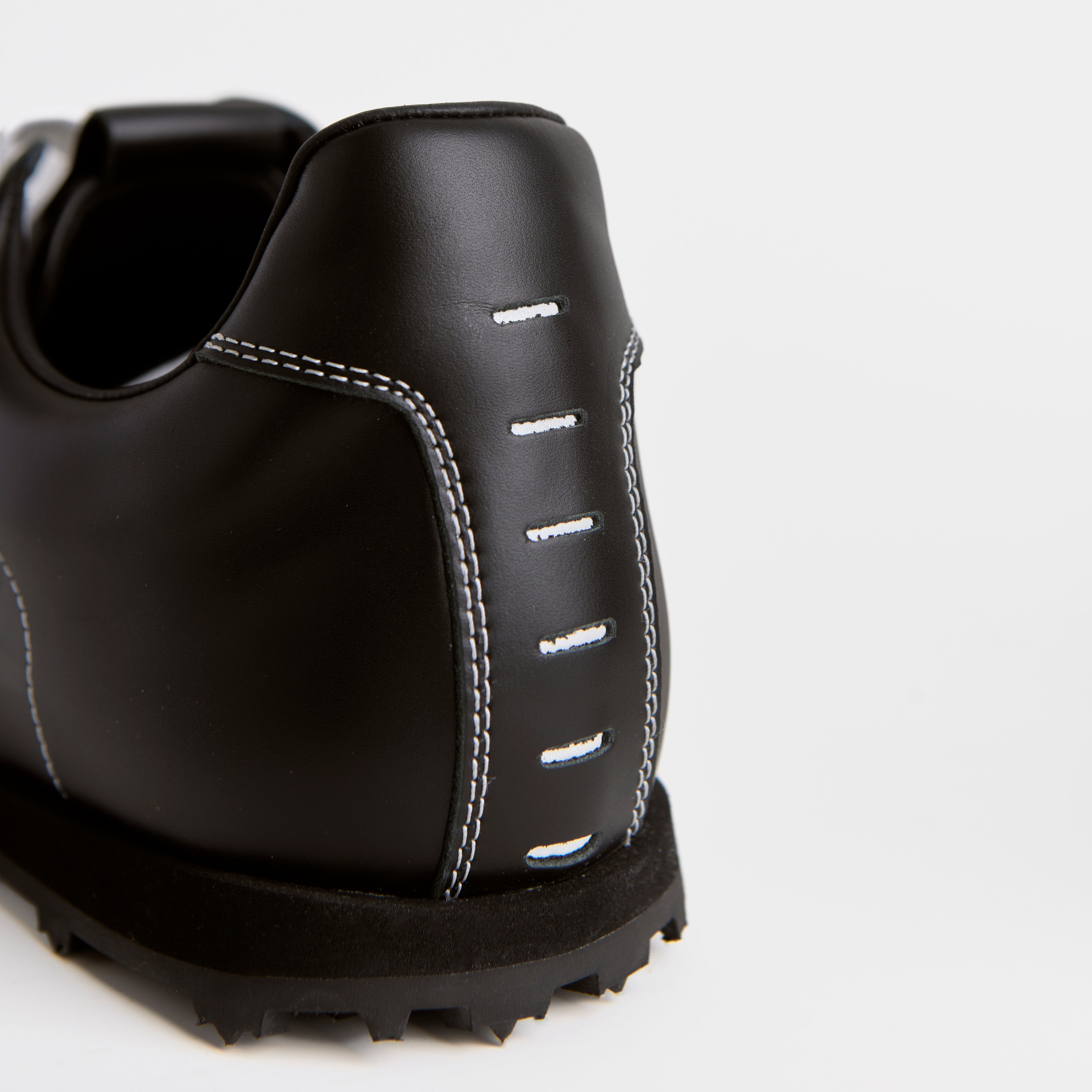 The Dual Stride Classic Black Leather Square-Toe Sneakers