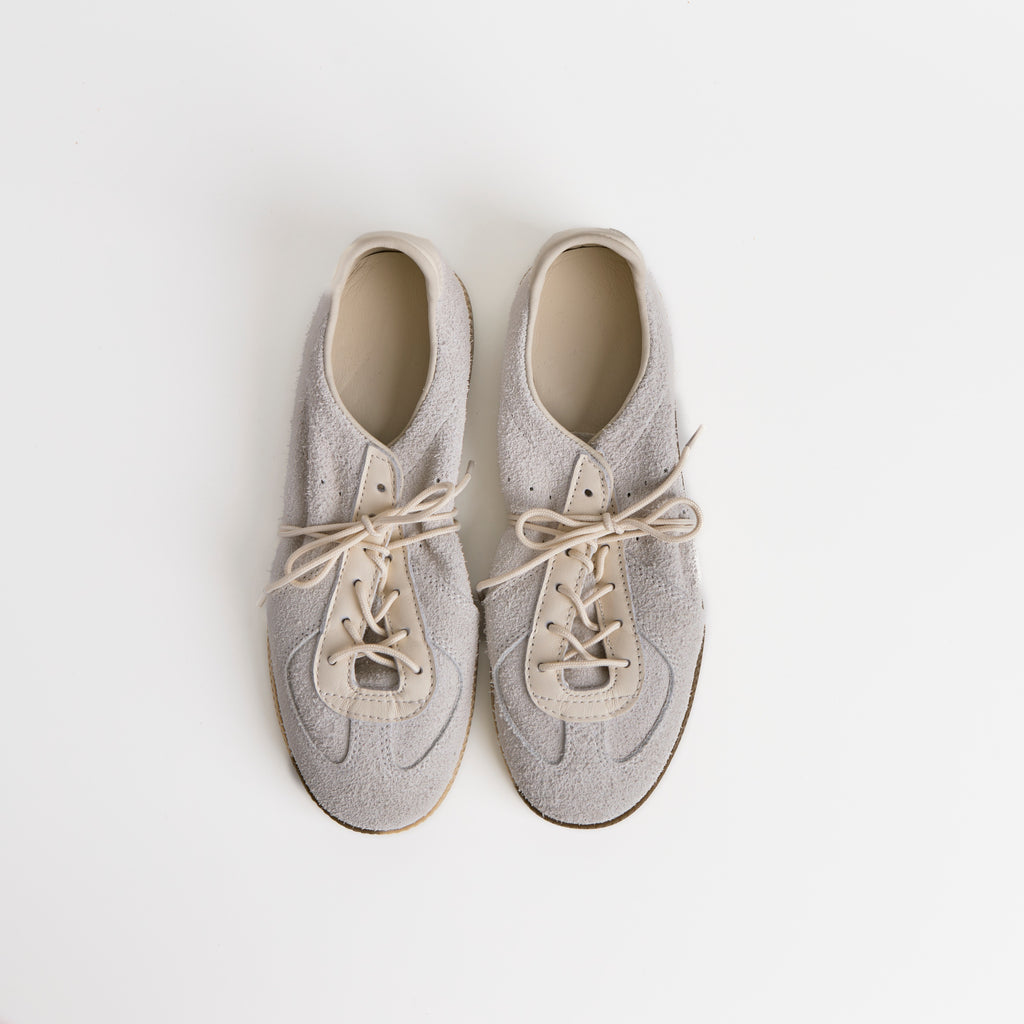The Dual Stride White Flexible Sheepskin Suede Sneakers