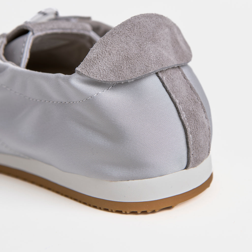 The Dual Stride Gray Square-Toe  Satin Trainer