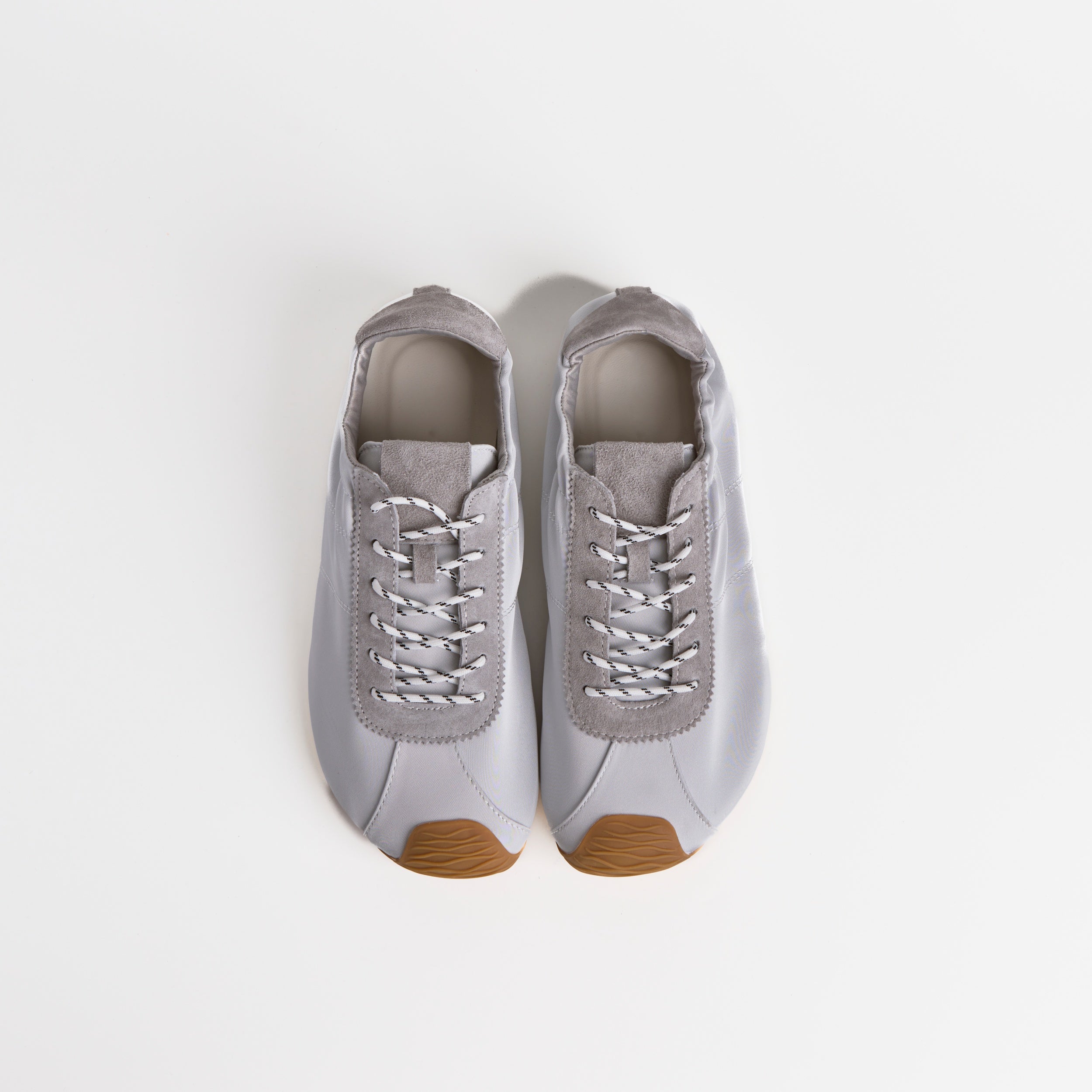 The Dual Stride Gray Square-Toe  Satin Trainer