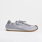 The Dual Stride Gray Square-Toe  Satin Trainer