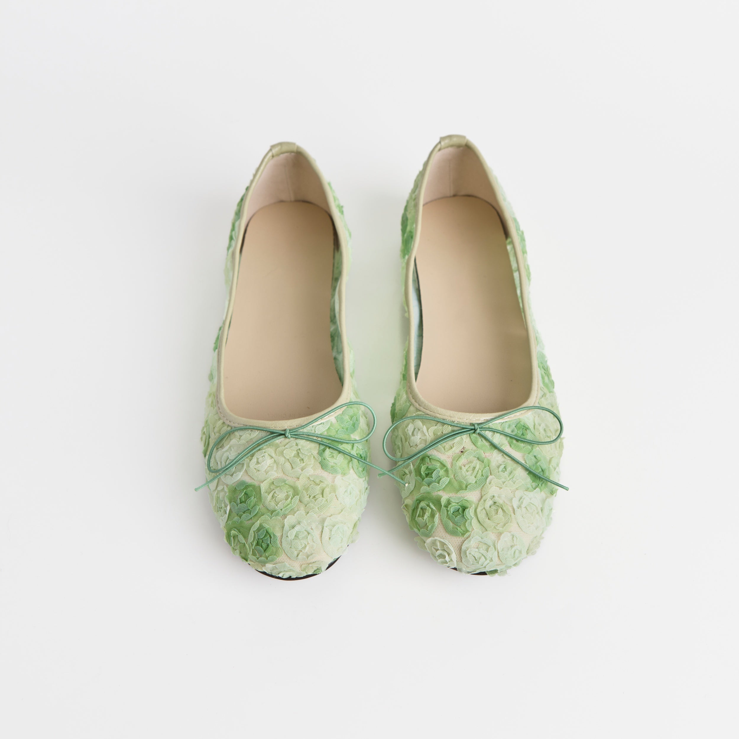 The Dual Stride Green Floral Lace Ballet Flats