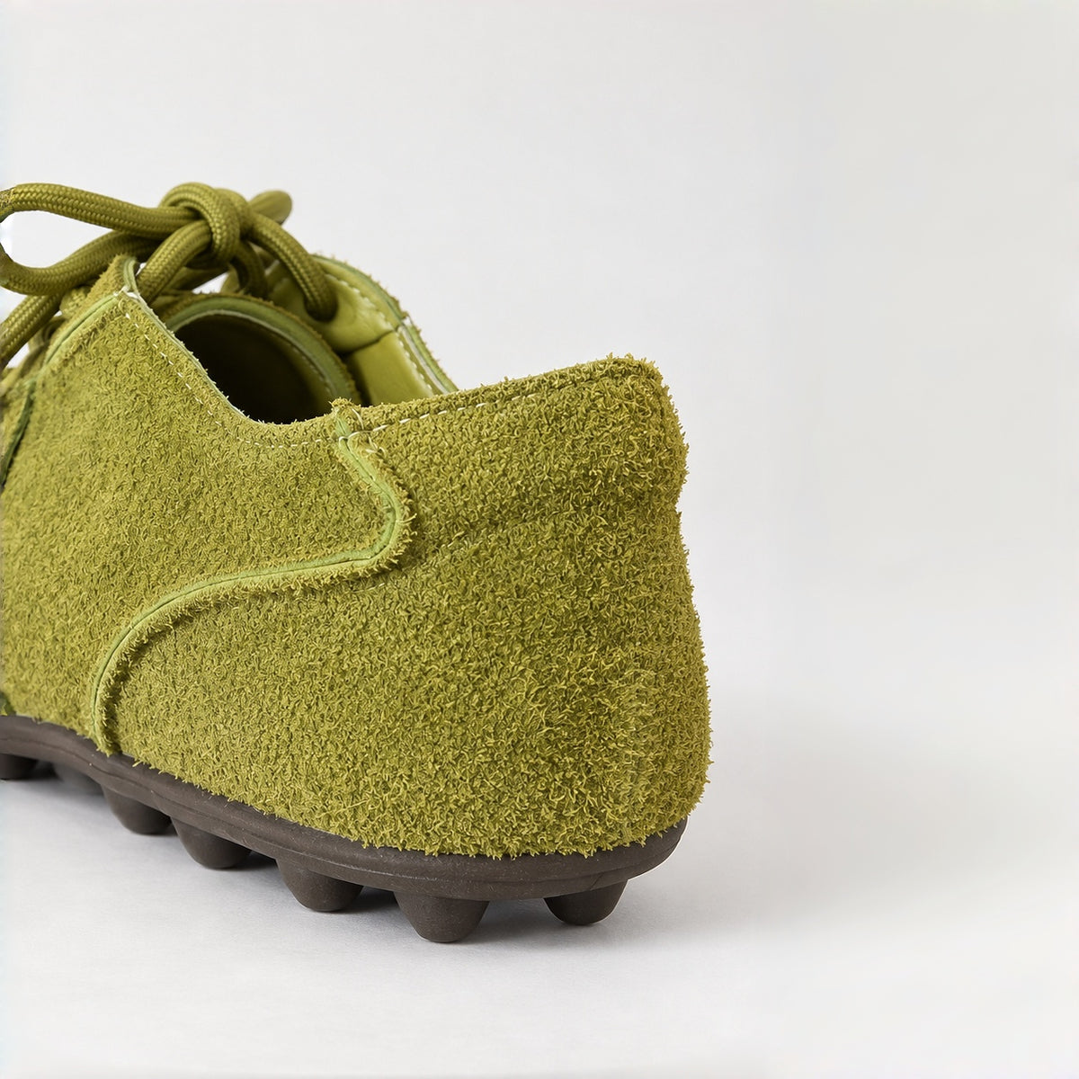 The Dual Stride Olive Green Suede Retro Sneakers
