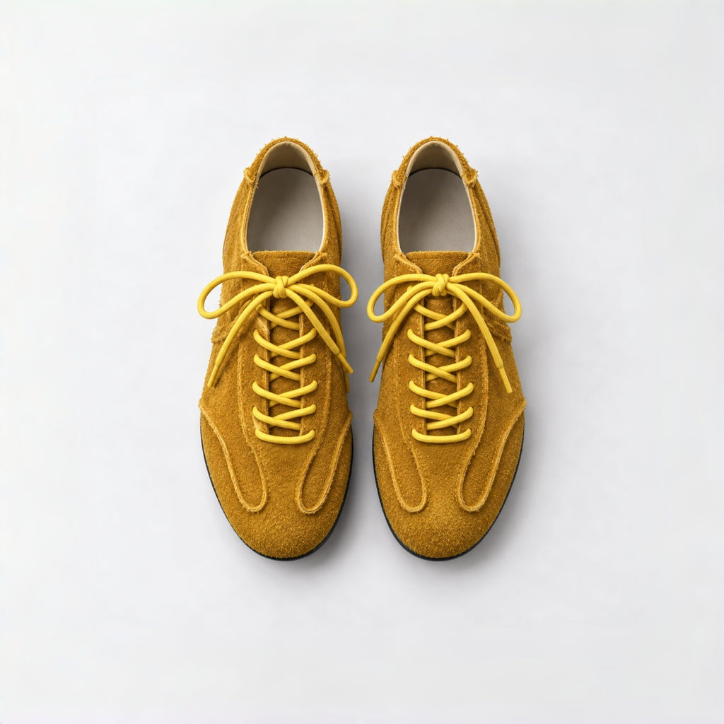 The Dual Stride Yellow Suede Retro Sneakers