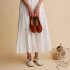 Los zapatos slip-on de cuero blancos minimalistas Dual Stride