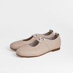 Las bailarinas planas Dual Stride de piel beige con cordones