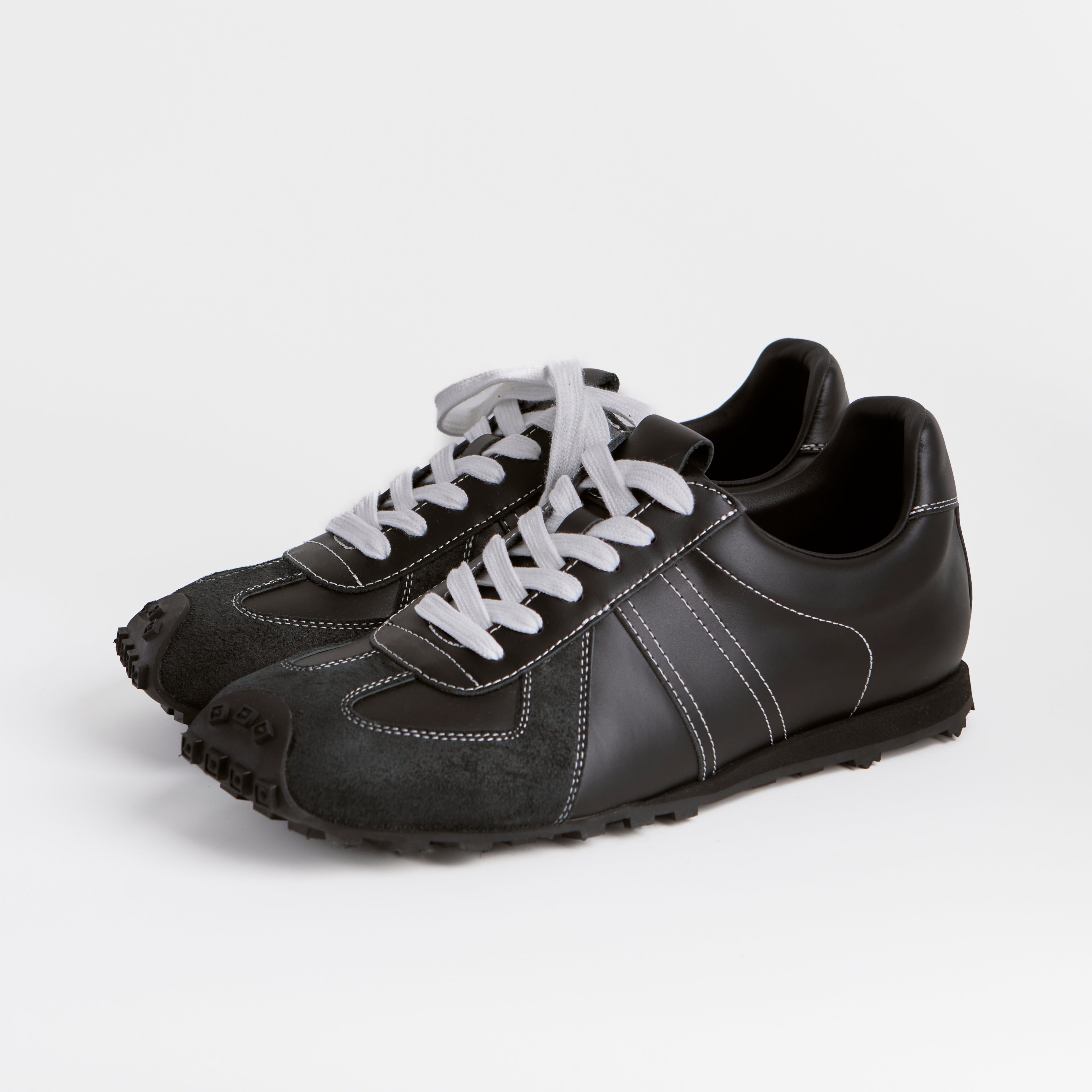The Dual Stride Classic Black Leather Square-Toe Sneakers
