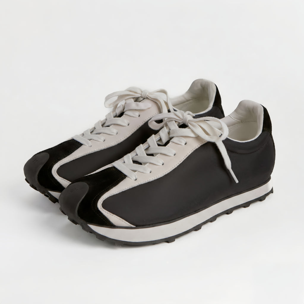 The Dual Stride Men‘s Black Urban Kinetic Runner