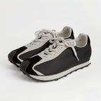 The Dual Stride Men‘s Black Urban Kinetic Runner