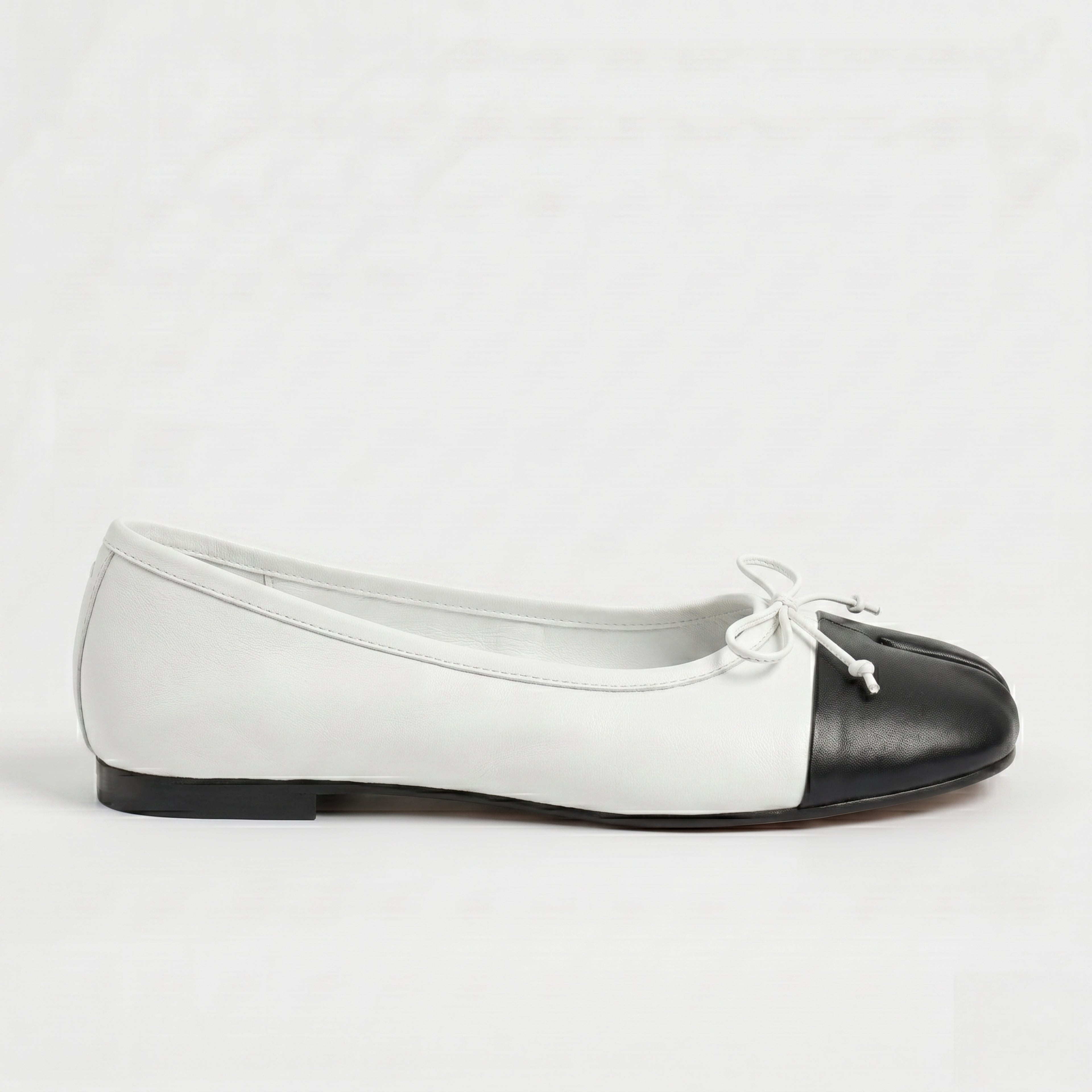The Dual Stride Soft White Lambskin Split-Toe Flats
