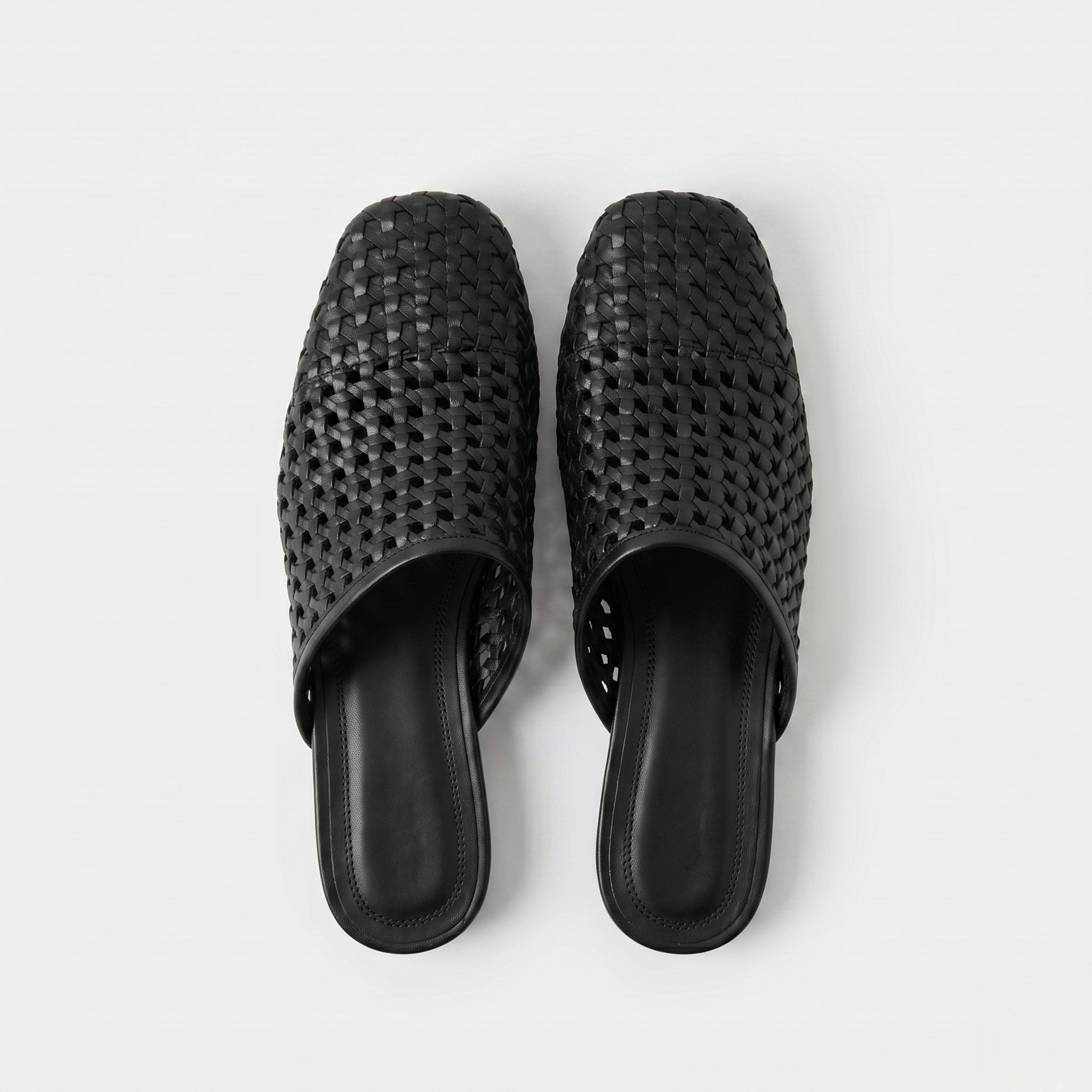 The Dual Stride Black Woven Leather Mules