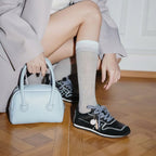 The Dual Stride Women‘s Retro Black Suede Sneakers