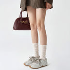 The Dual Stride Women‘s Distressed Leather Athletic Trainers