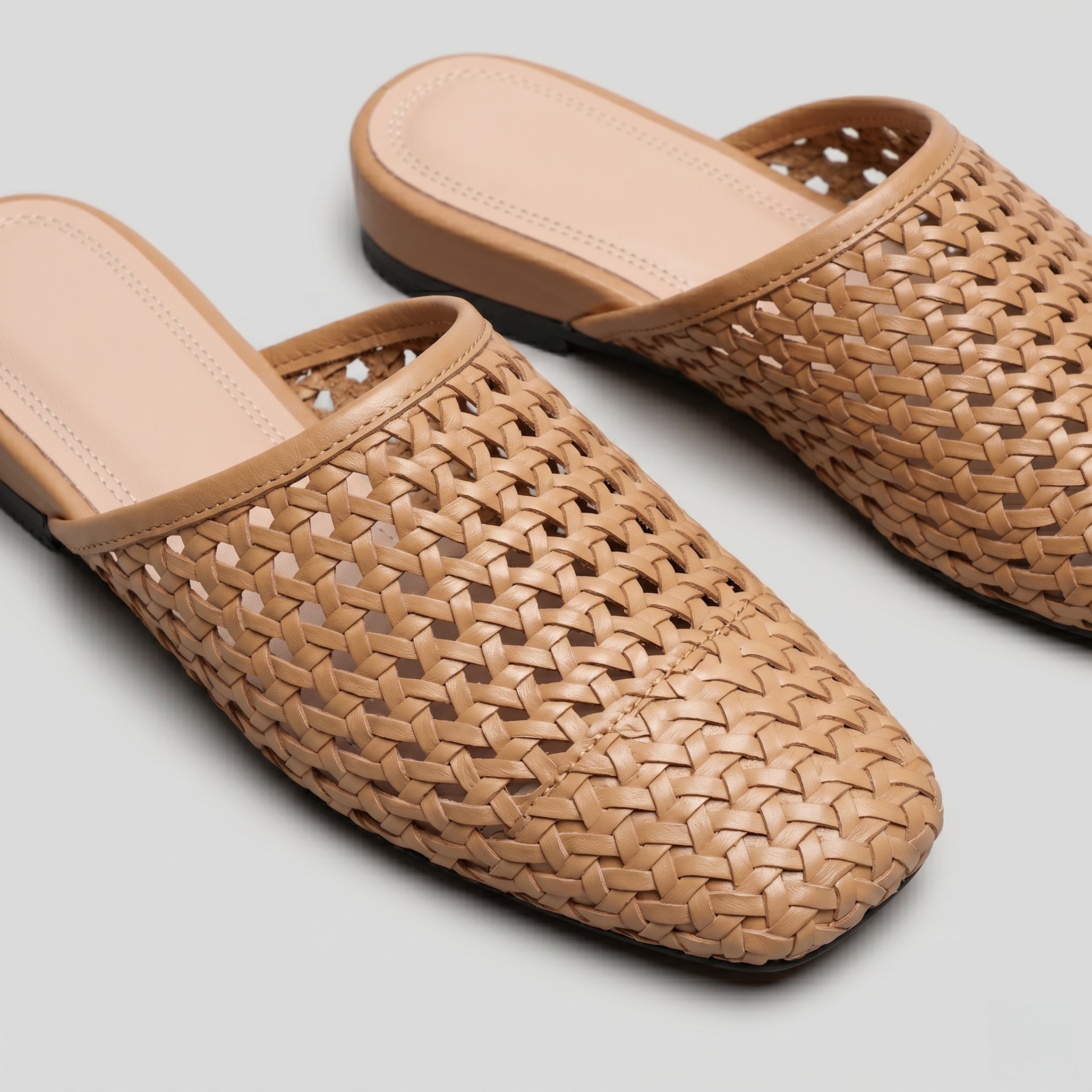 The Dual Stride Brown Woven Leather Mules