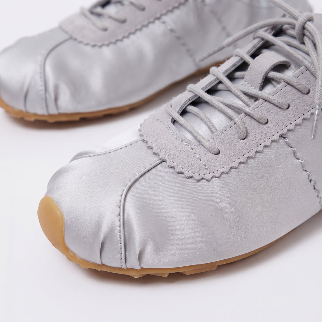 The Dual Stride Women‘s Gray Satin Ballet Trainers