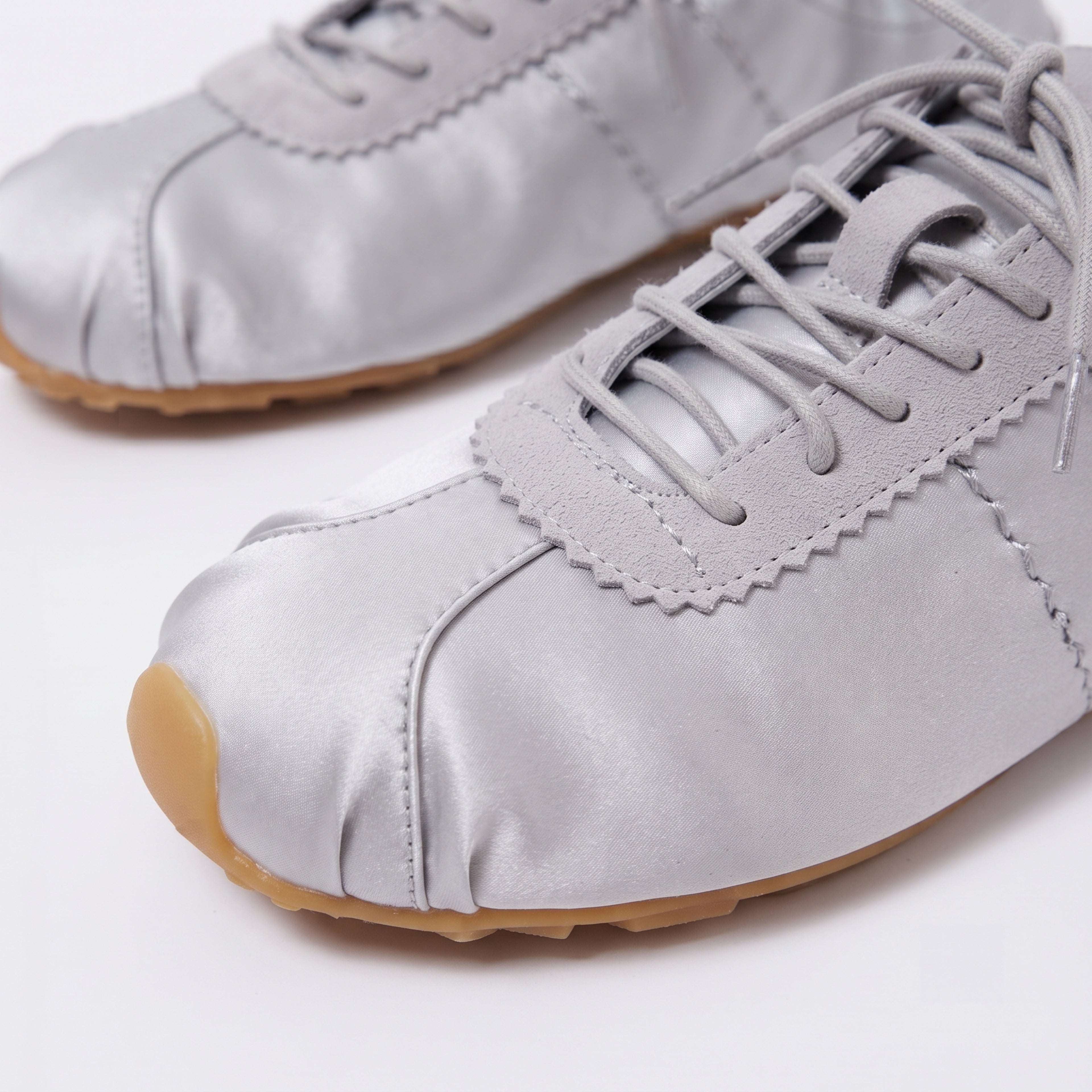 The Dual Stride Women‘s Gray Satin Ballet Trainers