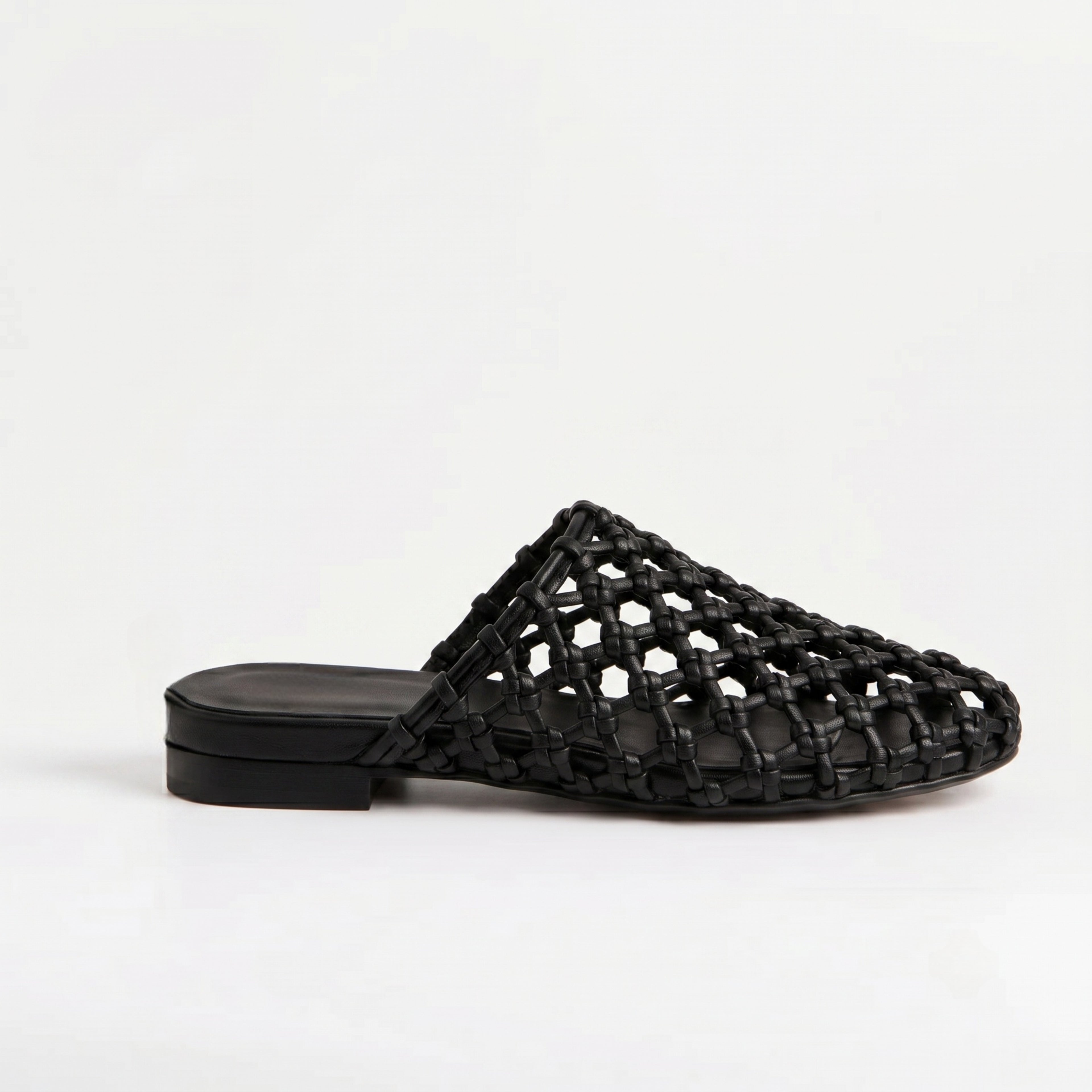 The Dual Stride Women's Black Woven Leather Mule