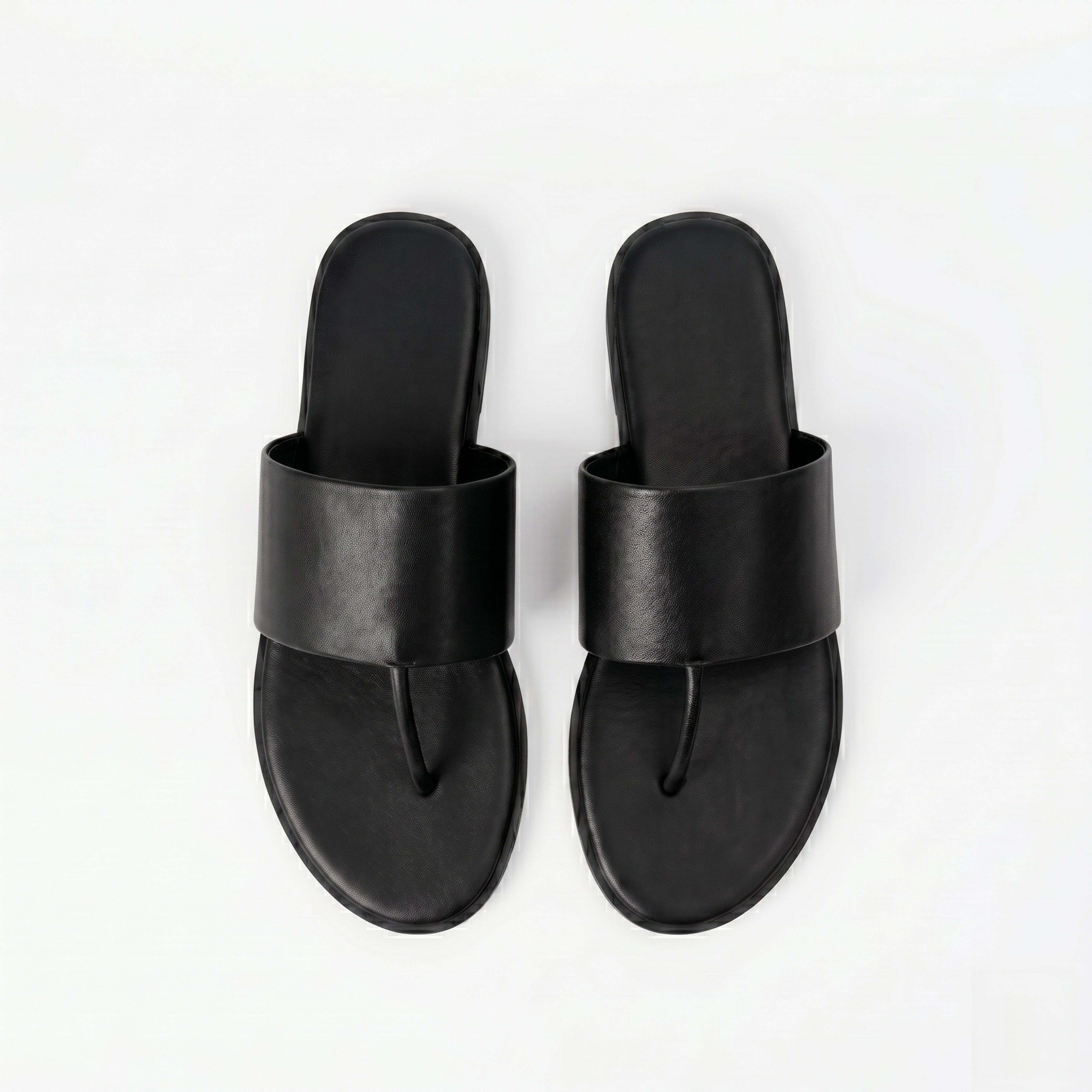 The Dual Stride Black Calfskin Thong Sandals