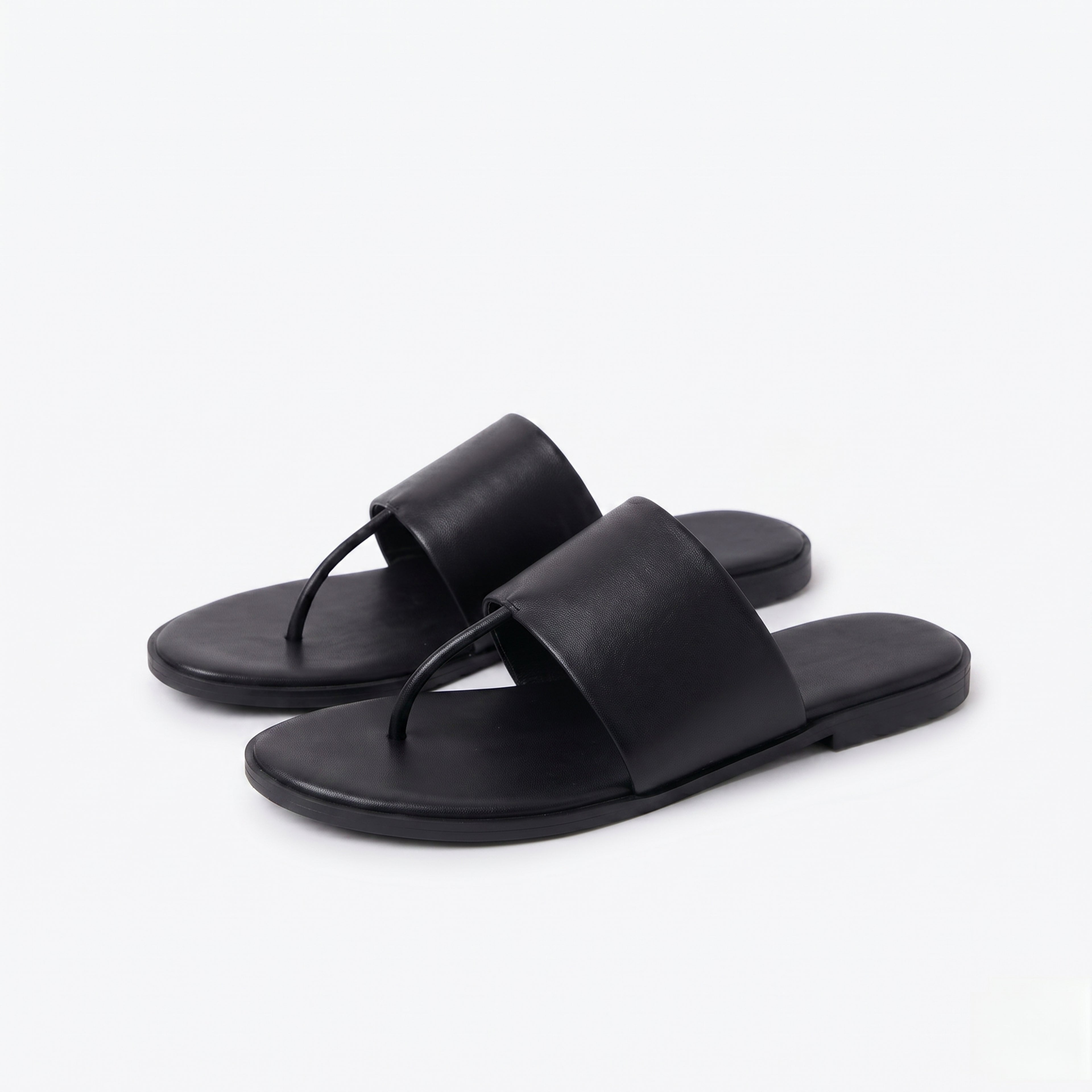 The Dual Stride Black Calfskin Thong Sandals