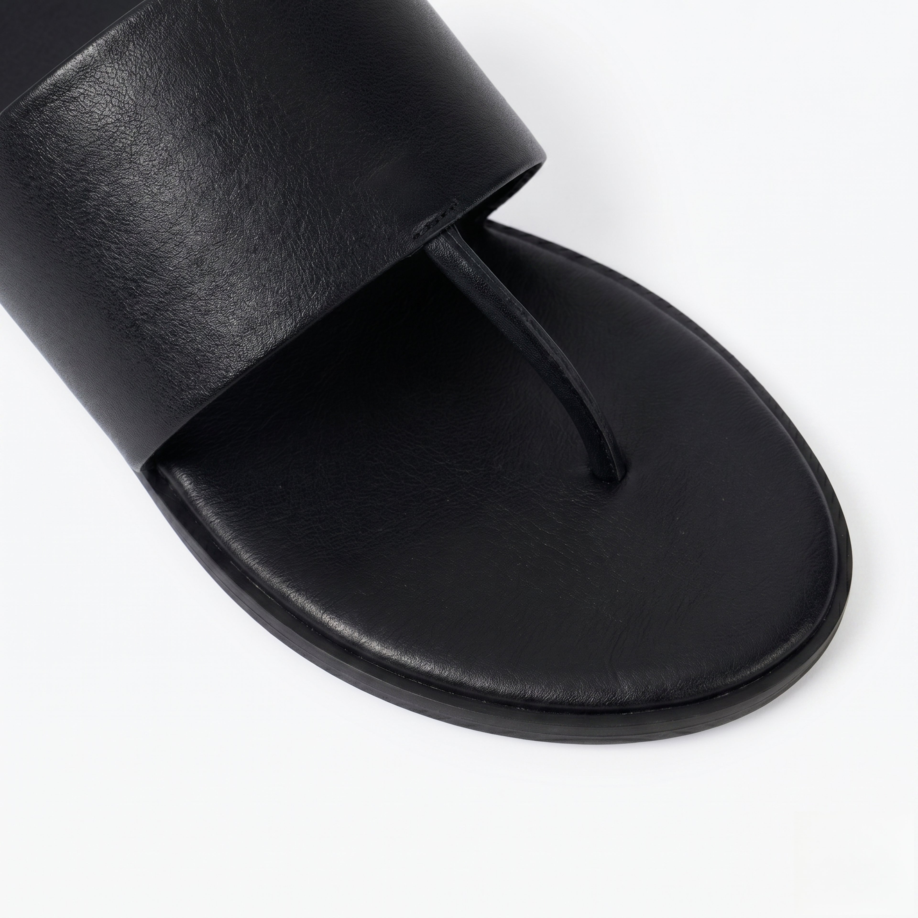 The Dual Stride Black Calfskin Thong Sandals