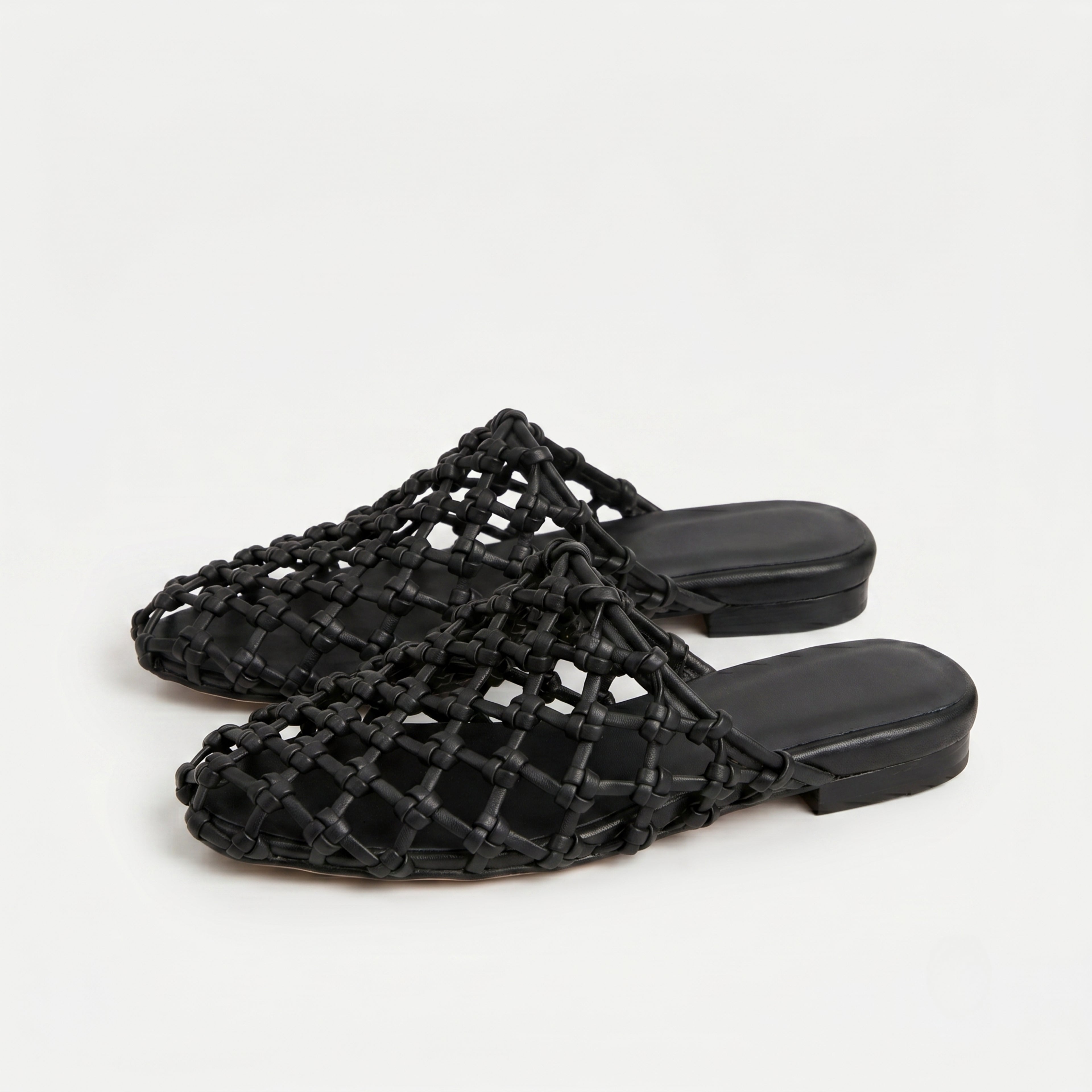 The Dual Stride Women's Black Woven Leather Mule