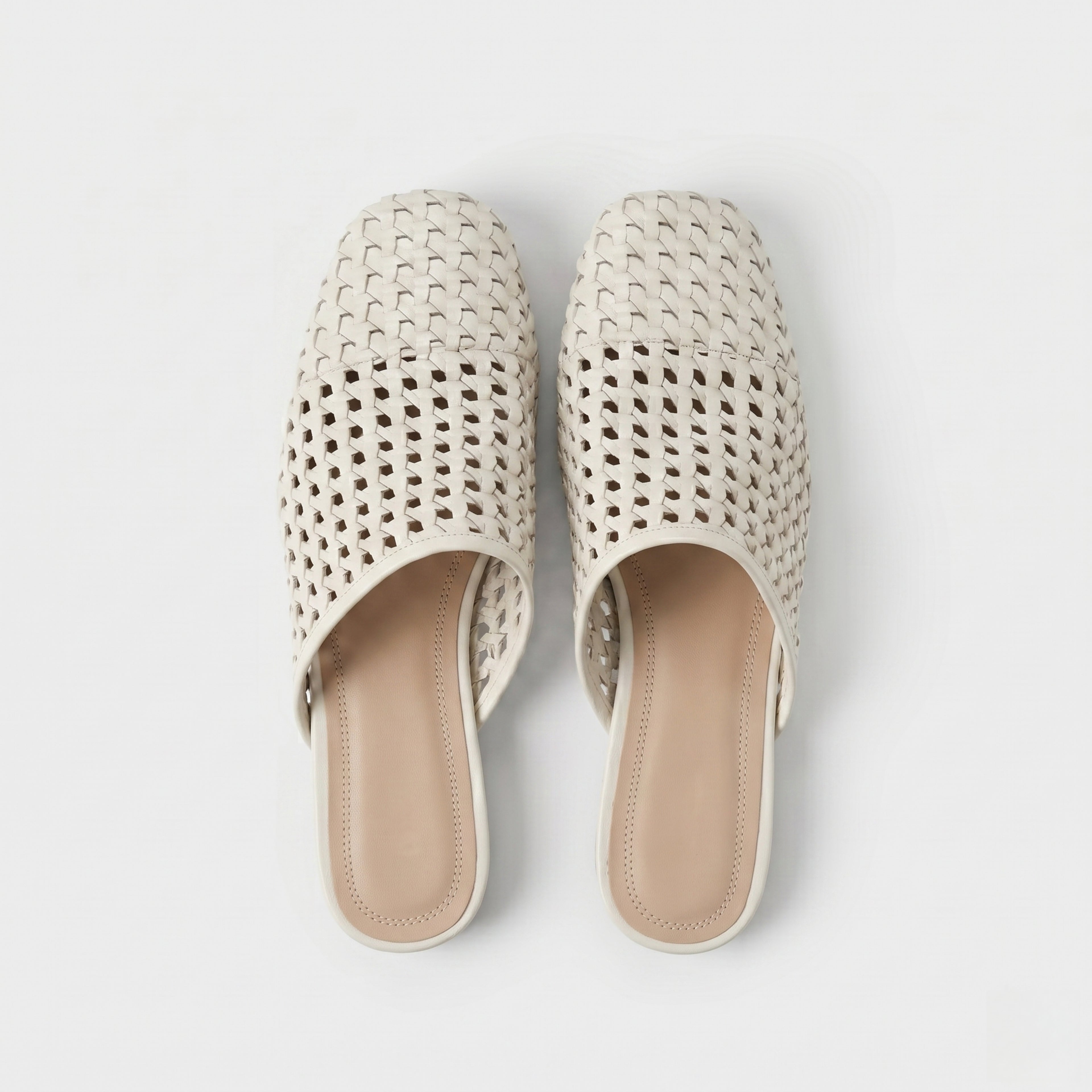 The Dual Stride White  Woven Leather Mules