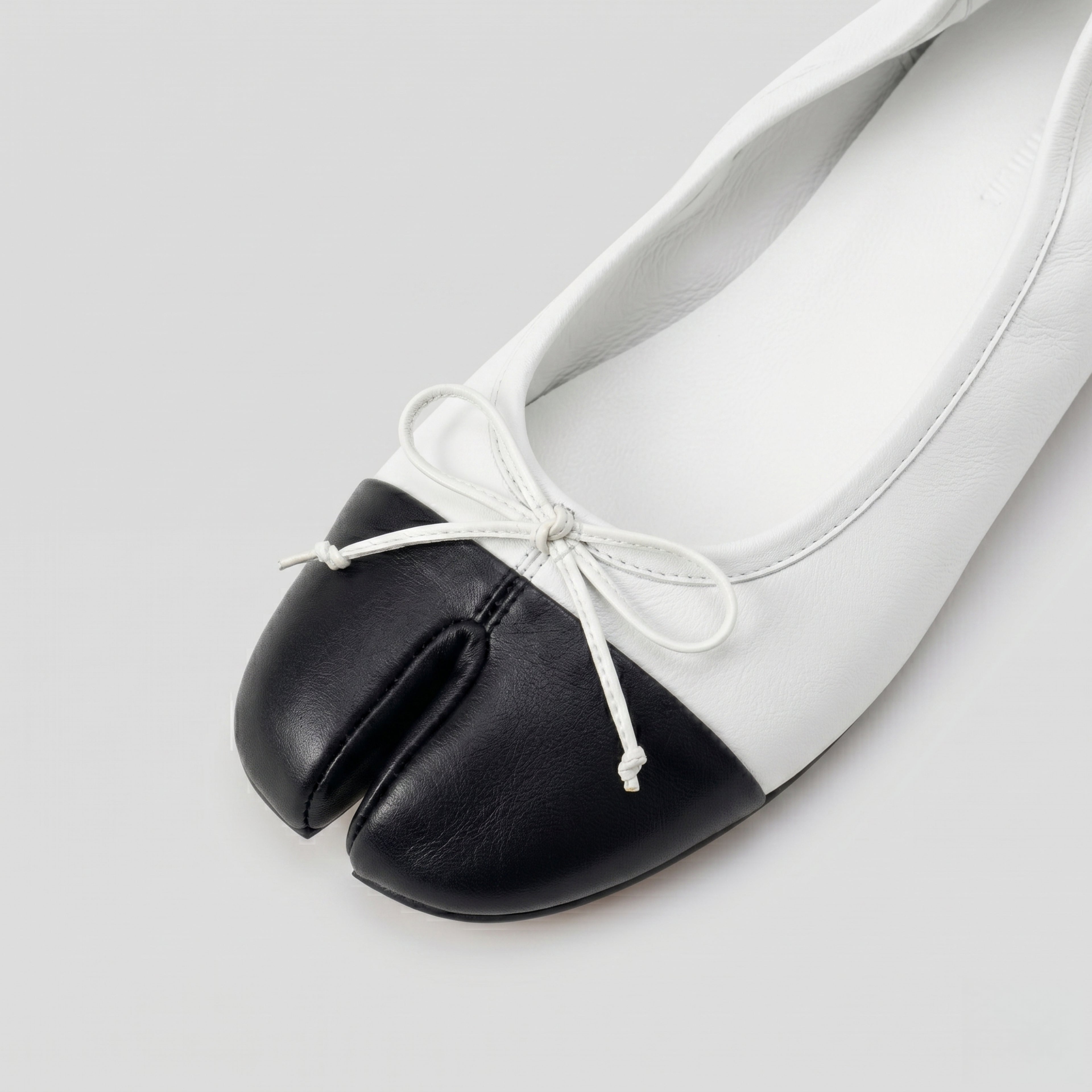 The Dual Stride Soft White Lambskin Split-Toe Flats