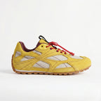 Las zapatillas deportivas casuales amarillas Dual Stride para mujer