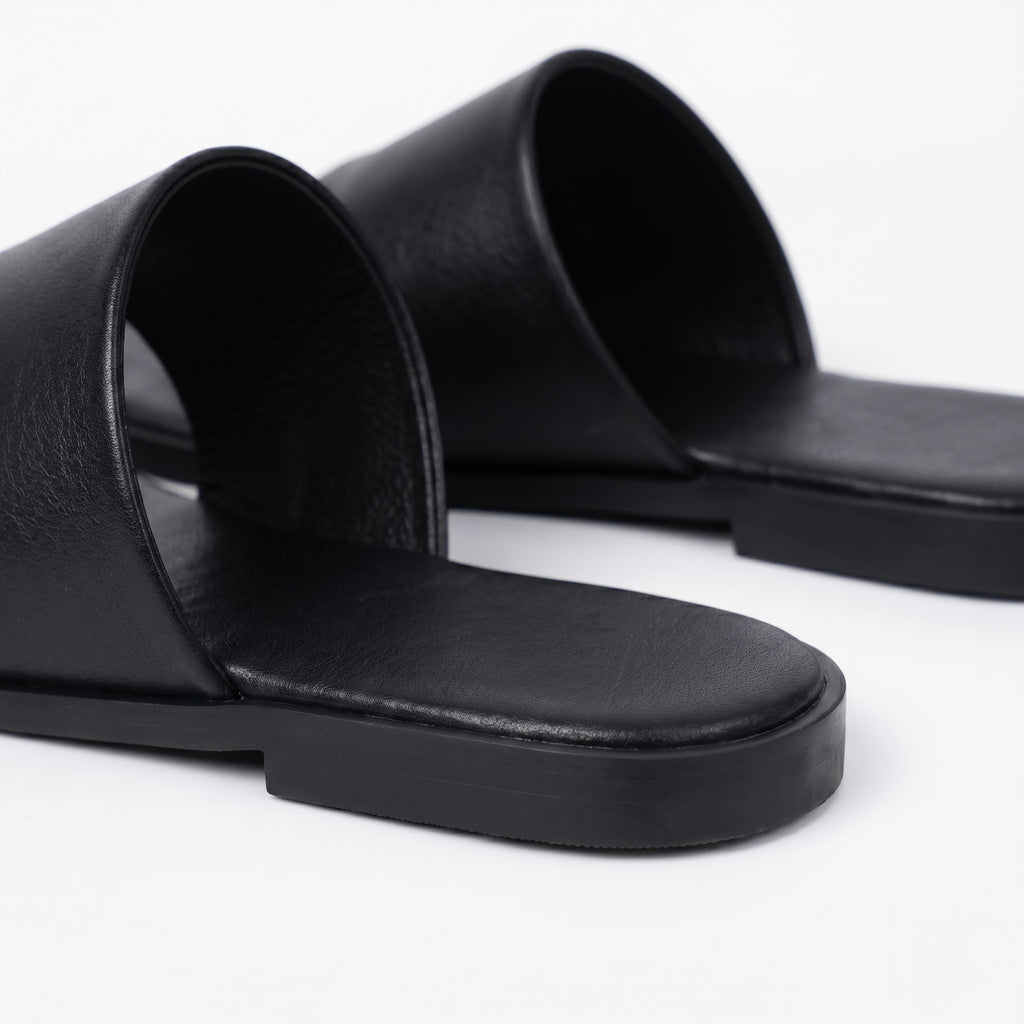 The Dual Stride Black Calfskin Thong Sandals