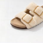 The Dual Stride Ivory Curly Faux Fur Double Buckle Slide Sandals
