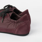 The Dual Stride Women‘s Red Light Flat Sneakers