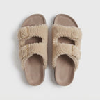 The Dual Stride Beige Curly Faux Fur Double Buckle Slide Sandals